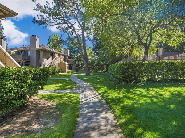 a view of a car parked in front of a house
