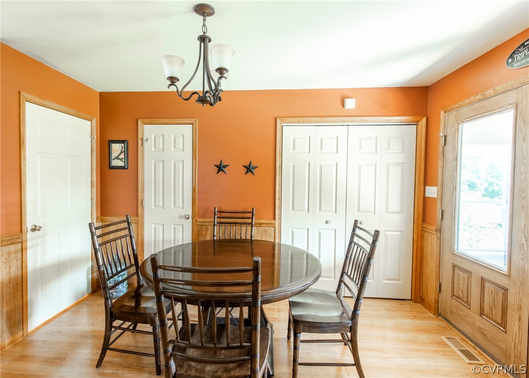 3676 Bell Road Dillwyn, VA 23936 - Photo 36 of 50 a view of a dining room with furniture window and wooden floor
