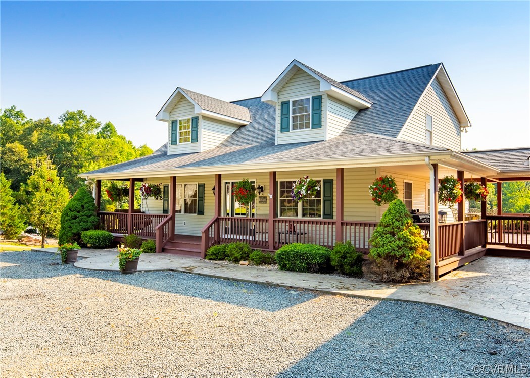 3676 Bell Road Dillwyn, VA 23936 - Photo 8 of 50 a front view of a house with garden and porch