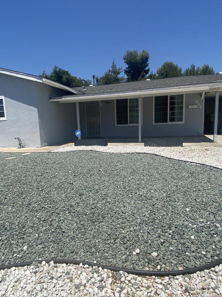 917 Broadview Street Spring Valley, CA 91977 - Photo 1 of 14 a view of a house with a yard