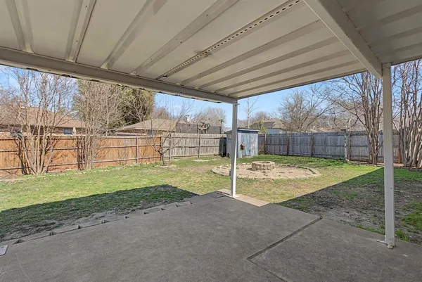 a view of backyard with green space