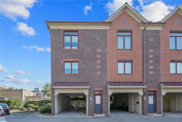 a front view of a house with yard