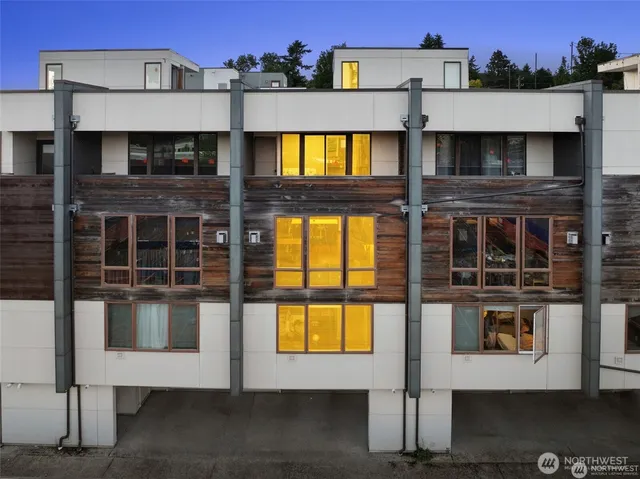 a front view of a building with a street