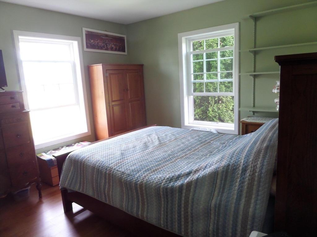 527 Old Post Road Worthington, MA 01098 - Photo 26 of 39 a bedroom with a bed and a window