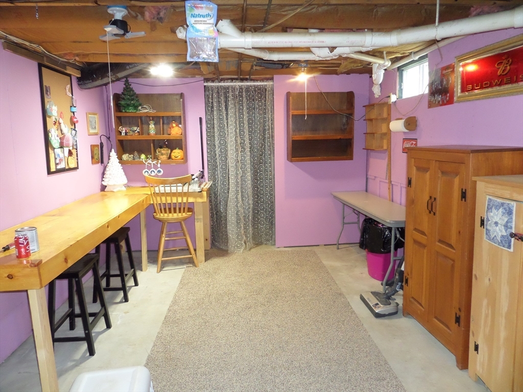 527 Old Post Road Worthington, MA 01098 - Photo 30 of 39 a view of a room with furniture and a flat screen tv