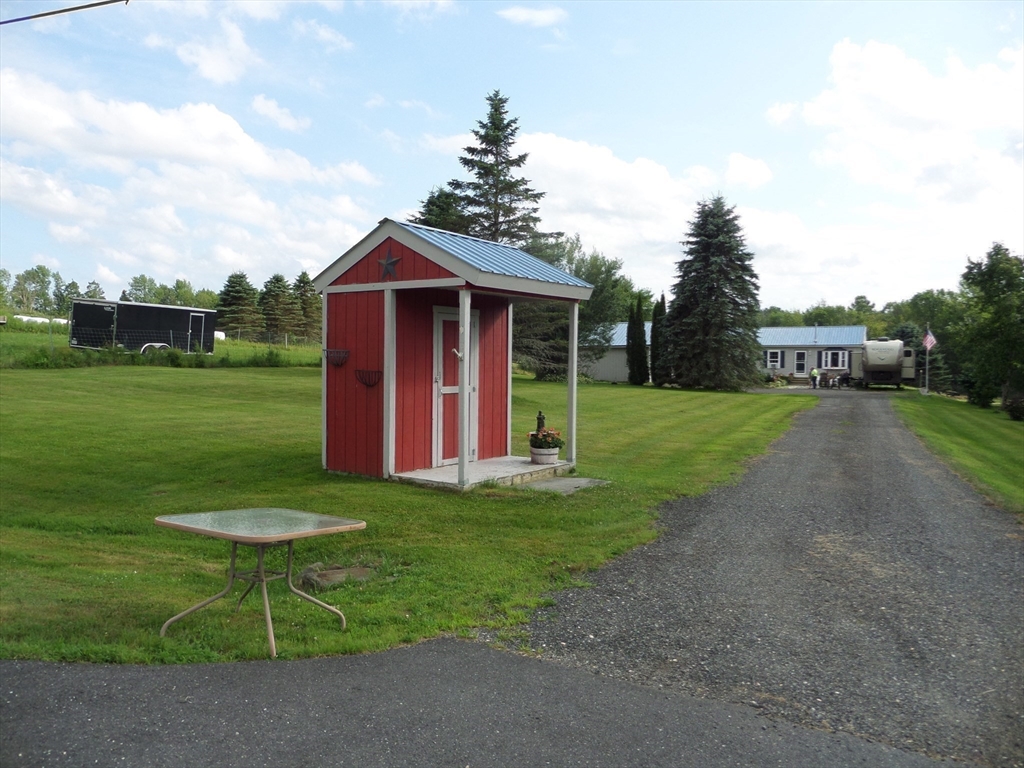 527 Old Post Road Worthington, MA 01098 - Photo 36 of 39 a view of a house with a yard