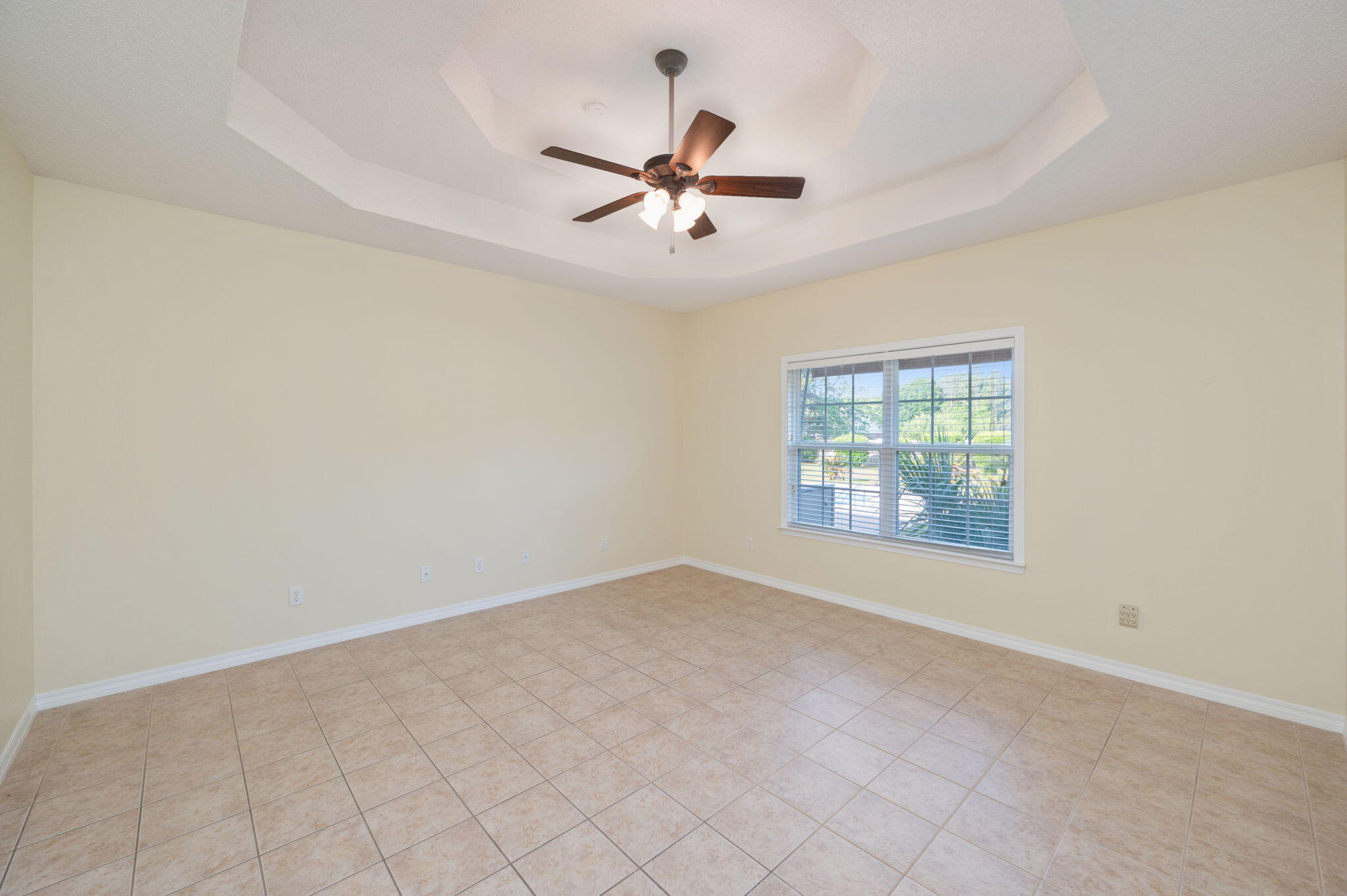 5552 Frontier Drive Crestview, FL 32536 - Photo 22 of 50 an empty room with fan and windows
