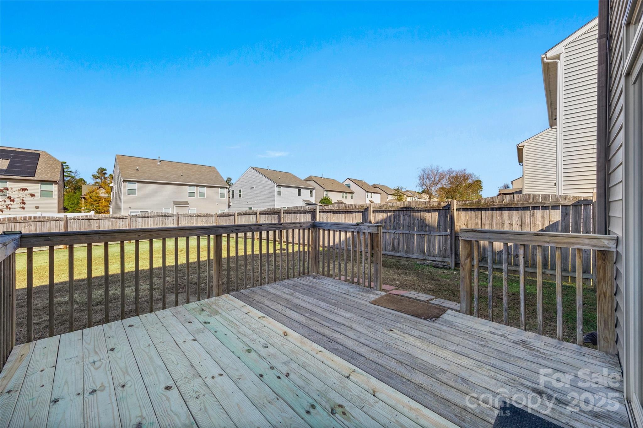 2811 Berry Creek Road Charlotte, NC 28214 - Photo 18 of 20 a view of balcony with wooden floor
