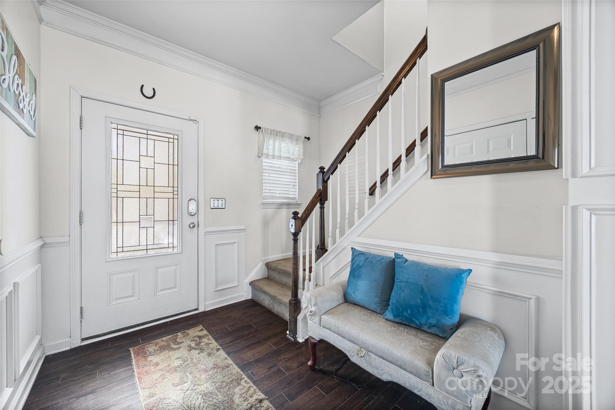 2811 Berry Creek Road Charlotte, NC 28214 - Photo 3 of 20 a living room with furniture and wooden floor