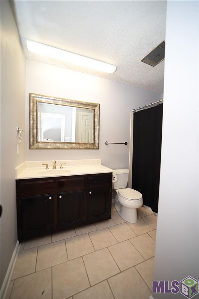 16153 Peairs Road Pride, LA 70770 - Photo 13 of 19 Hallway Bathroom
