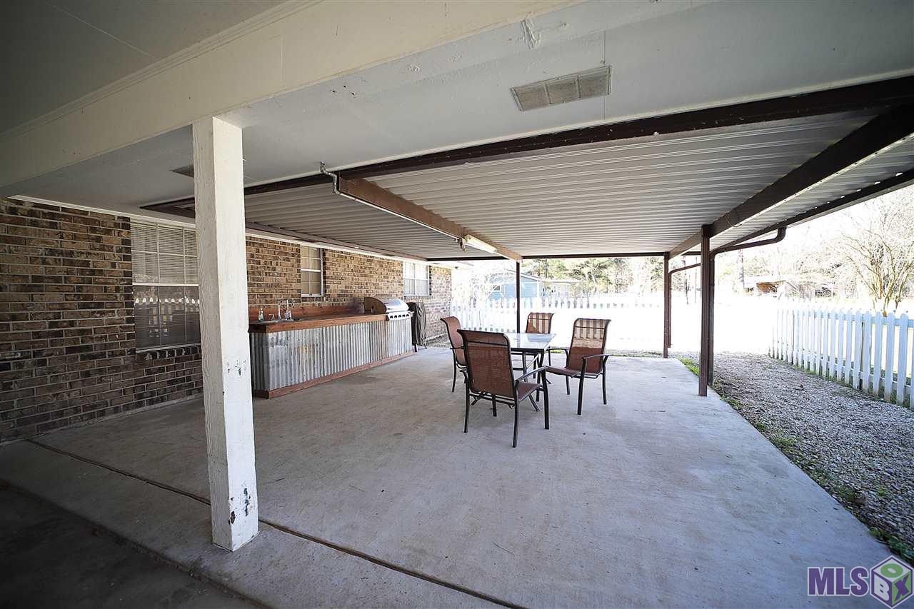 16153 Peairs Road Pride, LA 70770 - Photo 14 of 19 Patio with outdoor kitchen