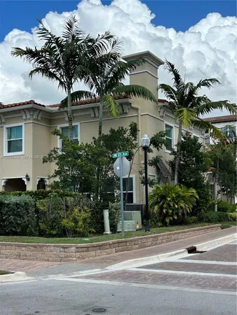 front view of a house with a street
