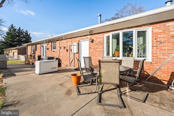 a building outdoor space with patio furniture