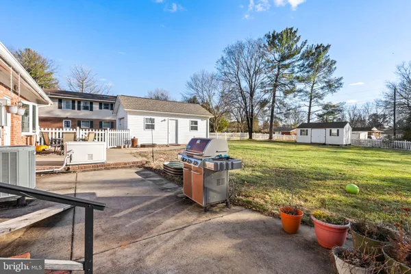 a house view with a backyard space