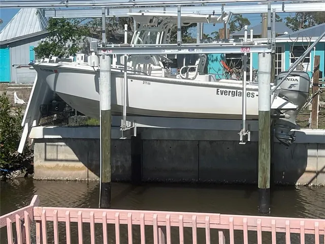 a view of swimming pool with outdoor seating and city view