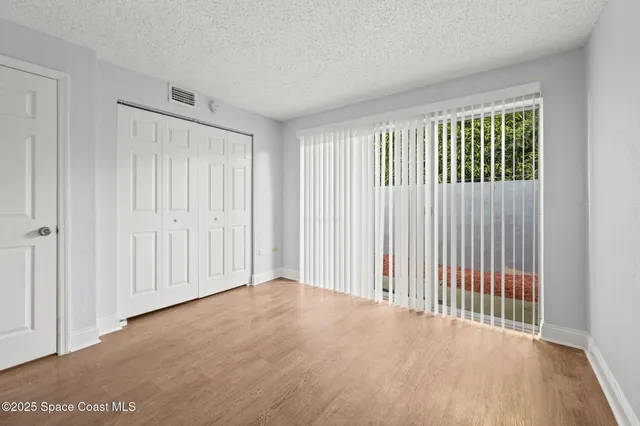 a view of a livingroom with a wooden floor
