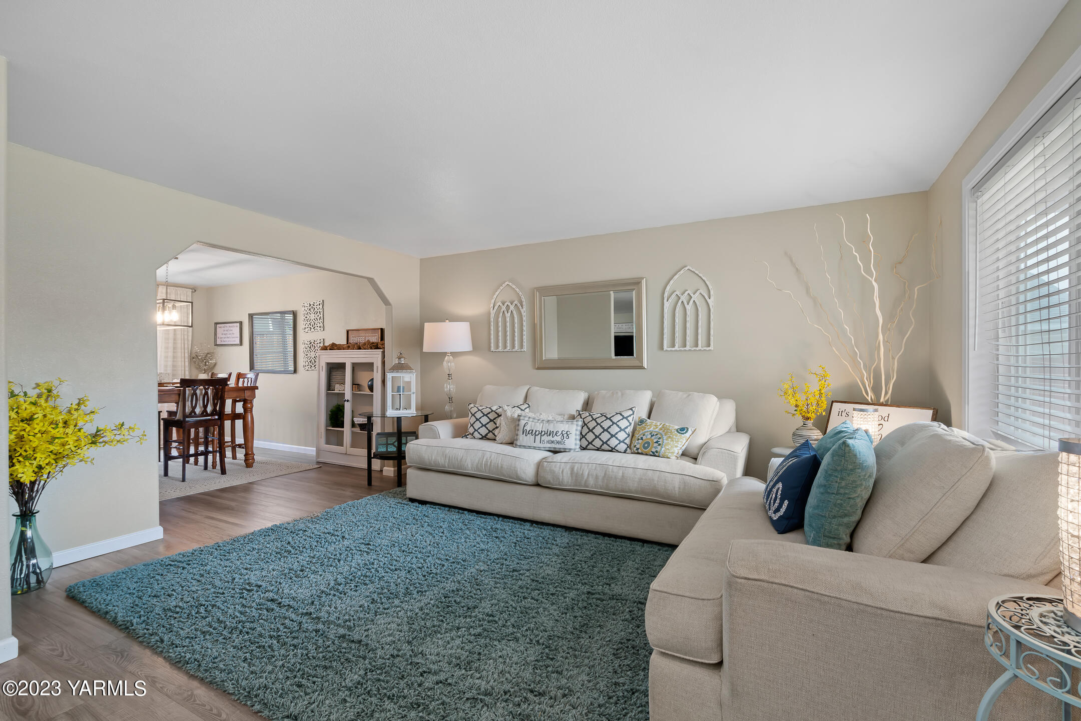 213 Perle Street Moxee, WA 98936 - Photo 5 of 27 a living room with furniture and wooden floor