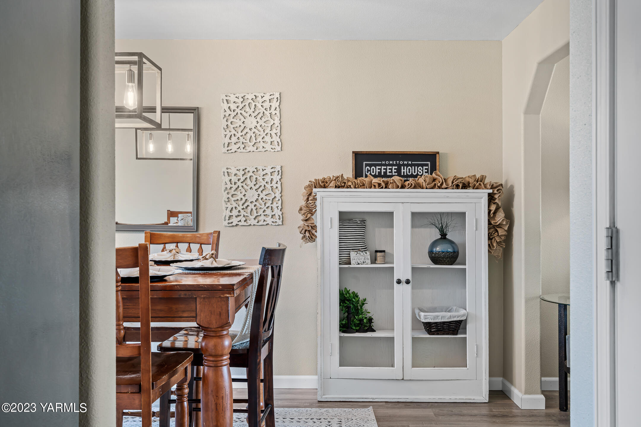 213 Perle Street Moxee, WA 98936 - Photo 8 of 27 a view of a hallway with seating area