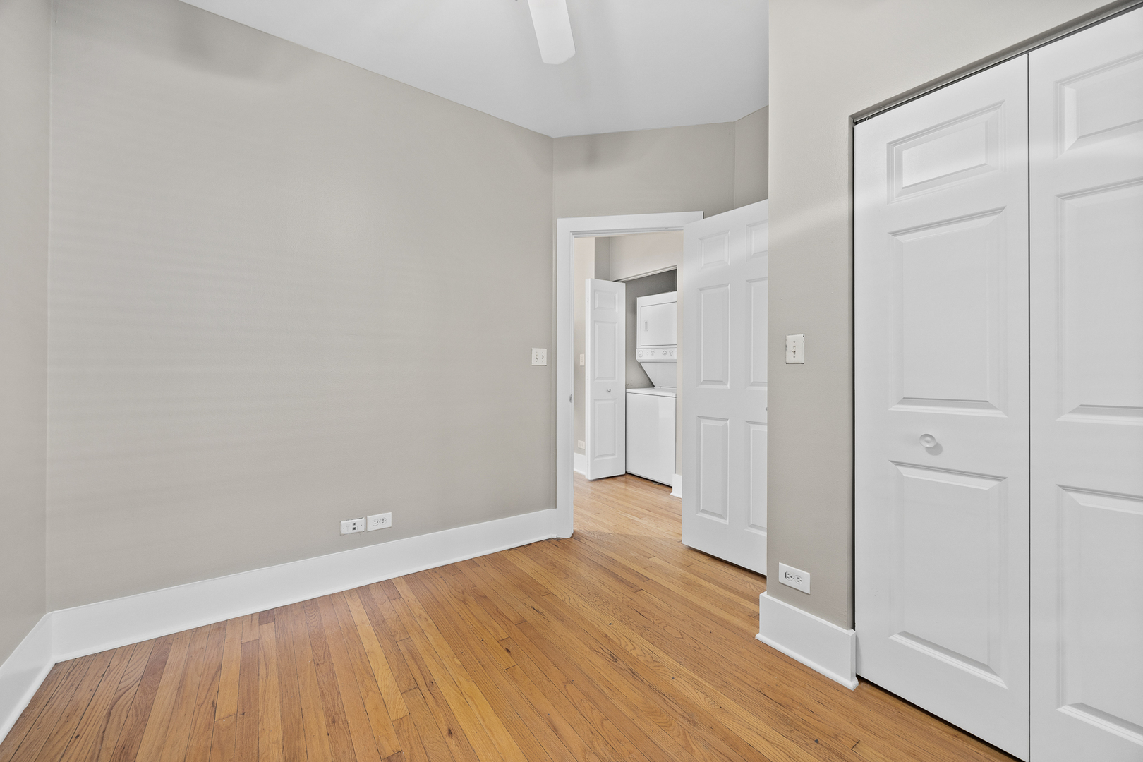 3418 North Wolcott Avenue, Unit 1N Chicago, IL 60657 - Photo 12 of 16 a view of an empty room with wooden floor
