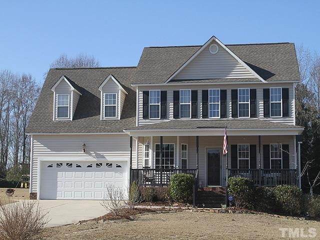 282 Saddle Ridge Drive Willow Spring, NC 27592 - Photo 1 of 23 a front view of a house with a yard