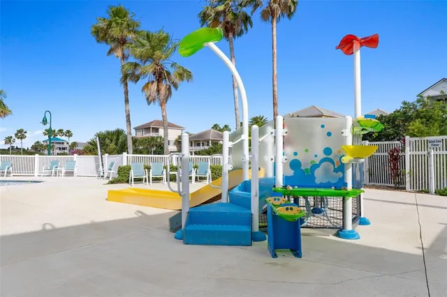 a view of a swimming pool with a lake view