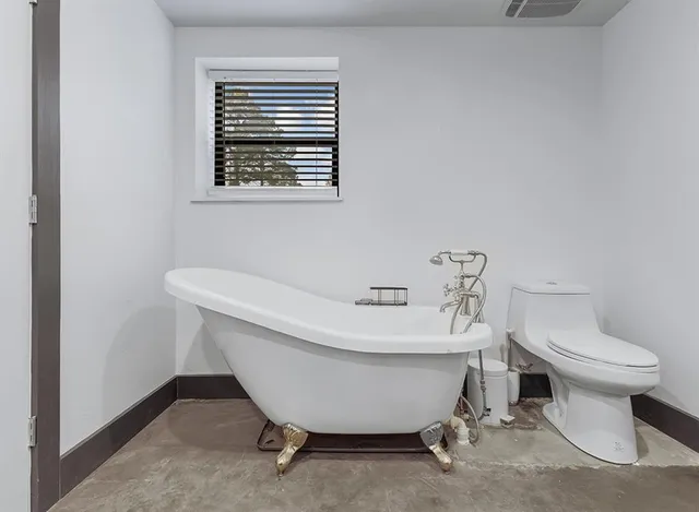 a bathroom with a sink and a toilet