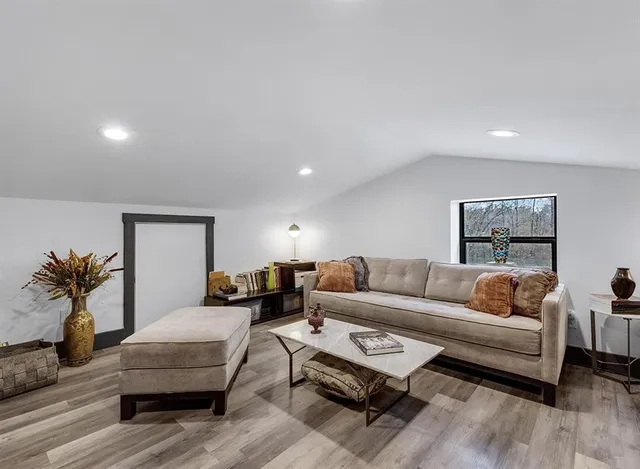 a living room with furniture and a couch