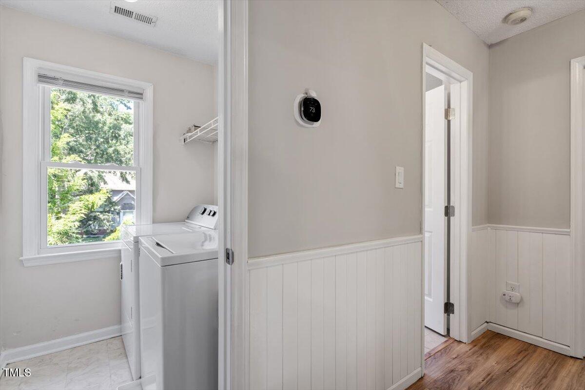 4714 Lazyriver Drive Durham, NC 27712 - Photo 26 of 37 a bathroom with a granite countertop shower and a window