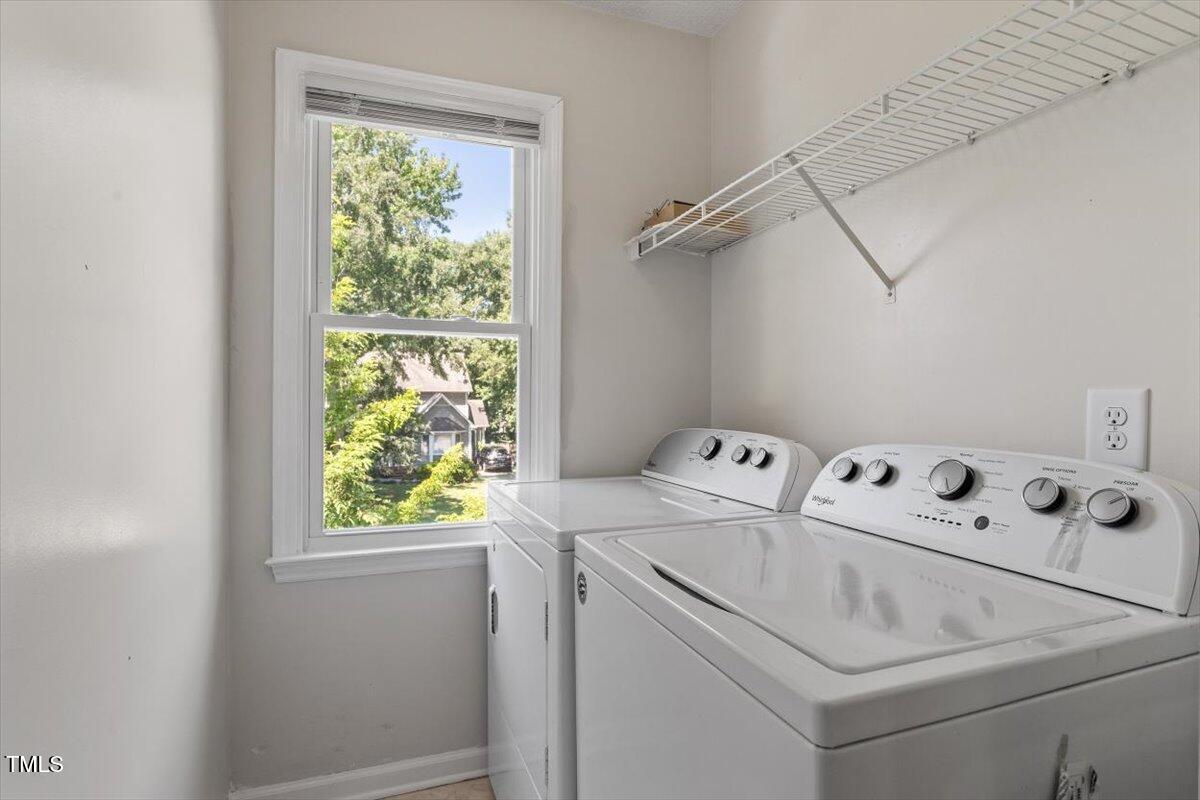 4714 Lazyriver Drive Durham, NC 27712 - Photo 27 of 37 a utility room with dryer and washer