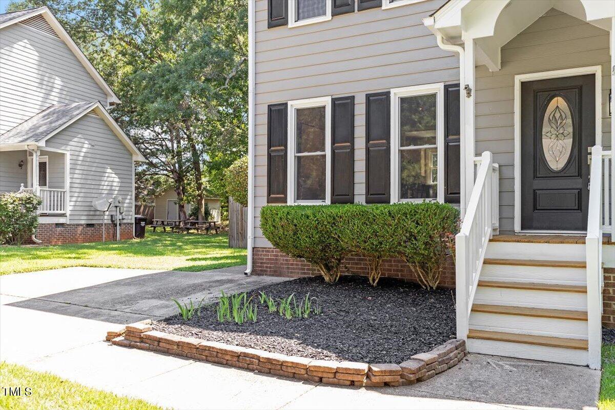 4714 Lazyriver Drive Durham, NC 27712 - Photo 29 of 37 a view of a house with a yard