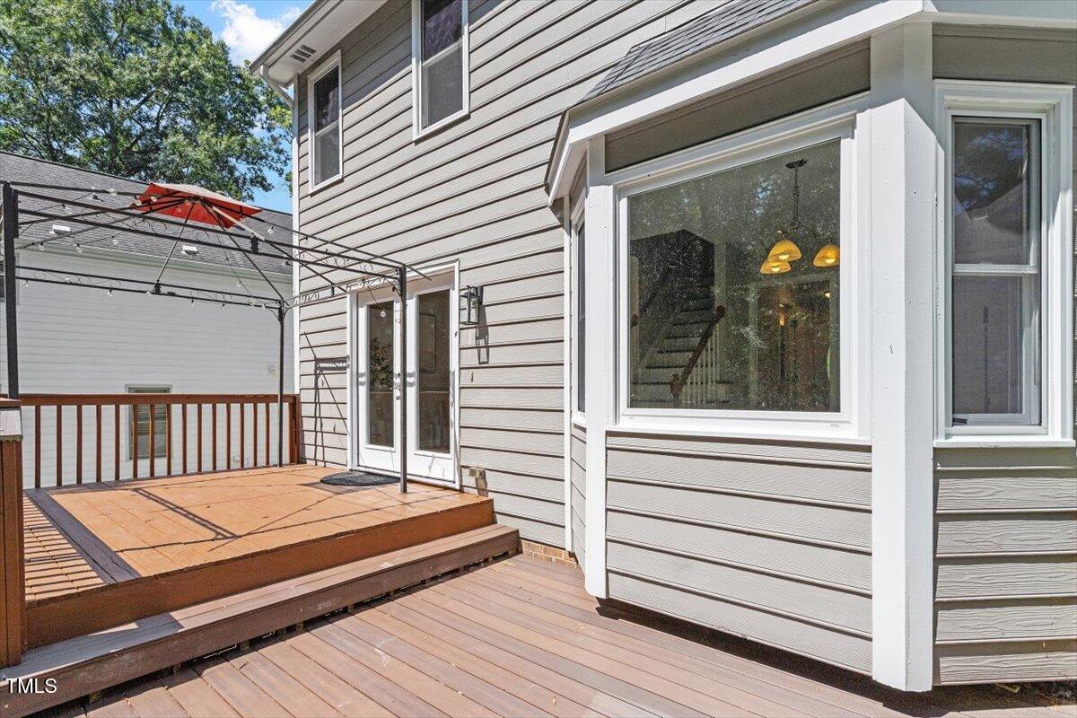 4714 Lazyriver Drive Durham, NC 27712 - Photo 30 of 37 a balcony with a hardwood floor