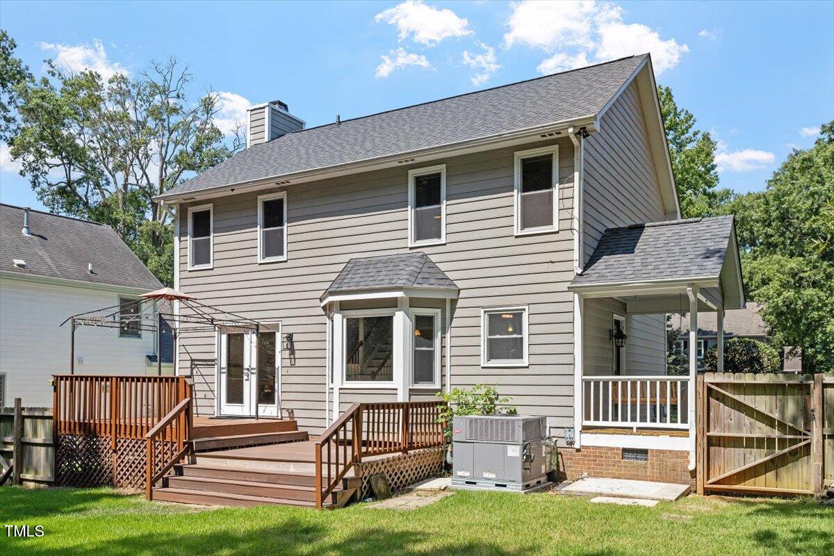 4714 Lazyriver Drive Durham, NC 27712 - Photo 33 of 37 a front view of a house with a yard