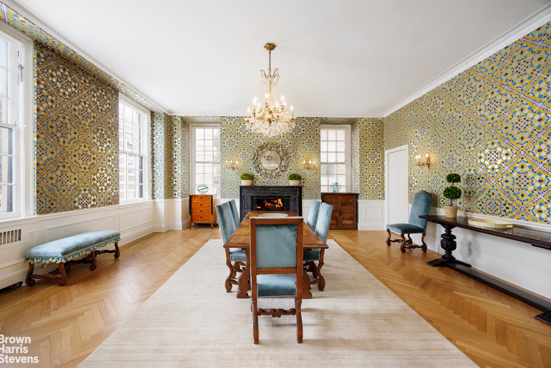 1001 Park Avenue, Unit 11 Manhattan, NY 10028 - Photo 6 of 17 a living room with furniture and a chandelier