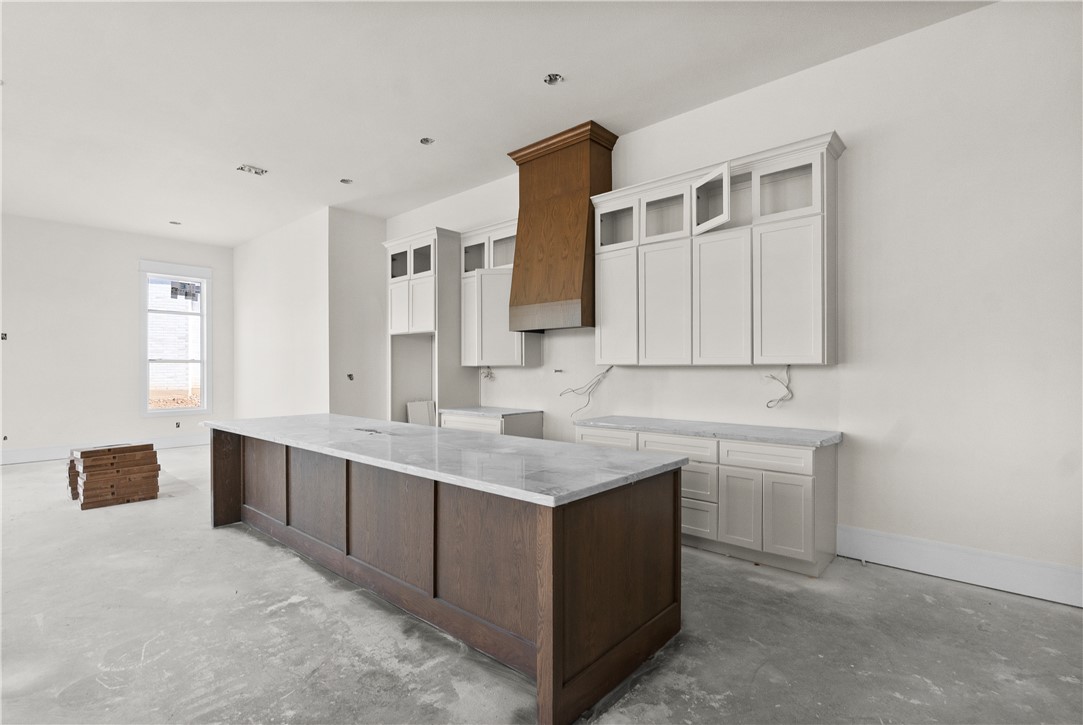 3026 Silverbell Court Bryan, TX 77807 - Photo 12 of 30 a kitchen with a sink and a cabinets