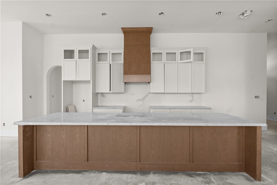 3026 Silverbell Court Bryan, TX 77807 - Photo 13 of 30 a bathroom with a sink and a mirror