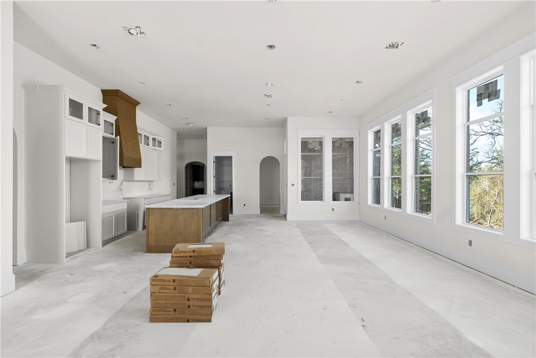 3026 Silverbell Court Bryan, TX 77807 - Photo 17 of 30 a living room with furniture and a large window