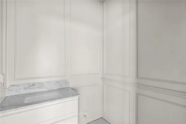 a room with cabinets and utility