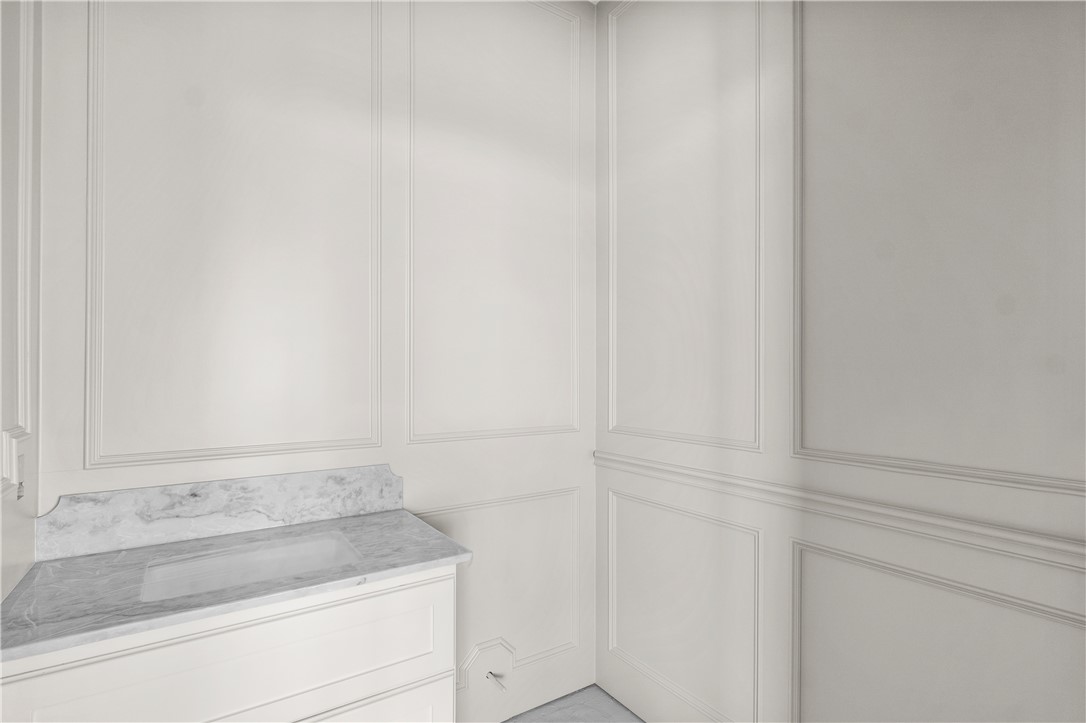 3026 Silverbell Court Bryan, TX 77807 - Photo 20 of 30 a bathroom with a sink and vanity