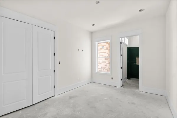 a bathroom with a bathtub and a sink
