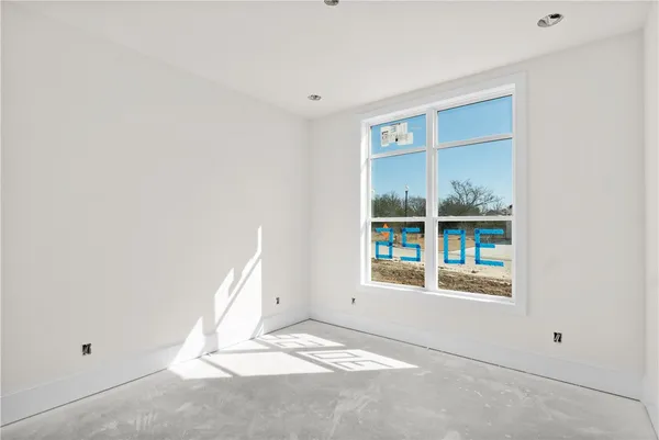 a view of a wooden door and a window