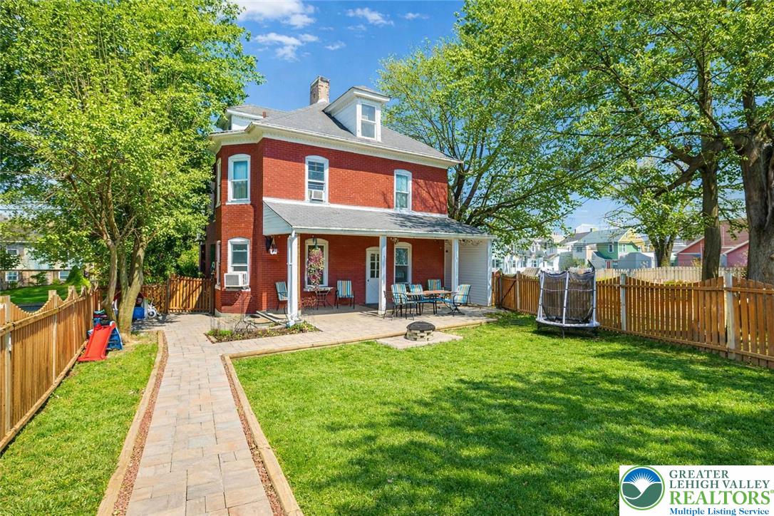 225 South Walnut Street Bath, PA 18014 - Photo 18 of 20 a front view of a house with swimming pool and porch