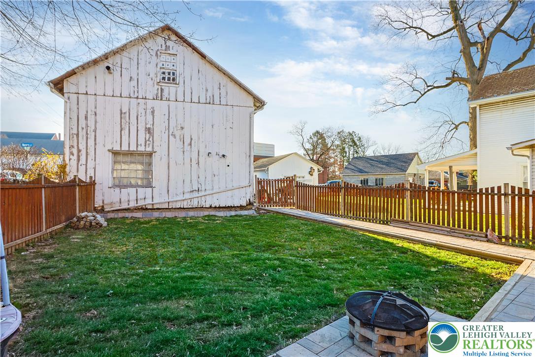 225 South Walnut Street Bath, PA 18014 - Photo 19 of 20 a view of backyard with garden and deck