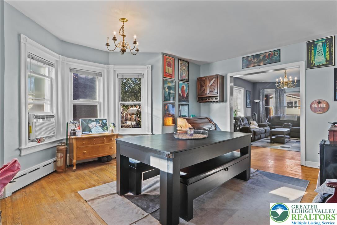 225 South Walnut Street Bath, PA 18014 - Photo 8 of 20 a dining room with wooden floor and chandelier