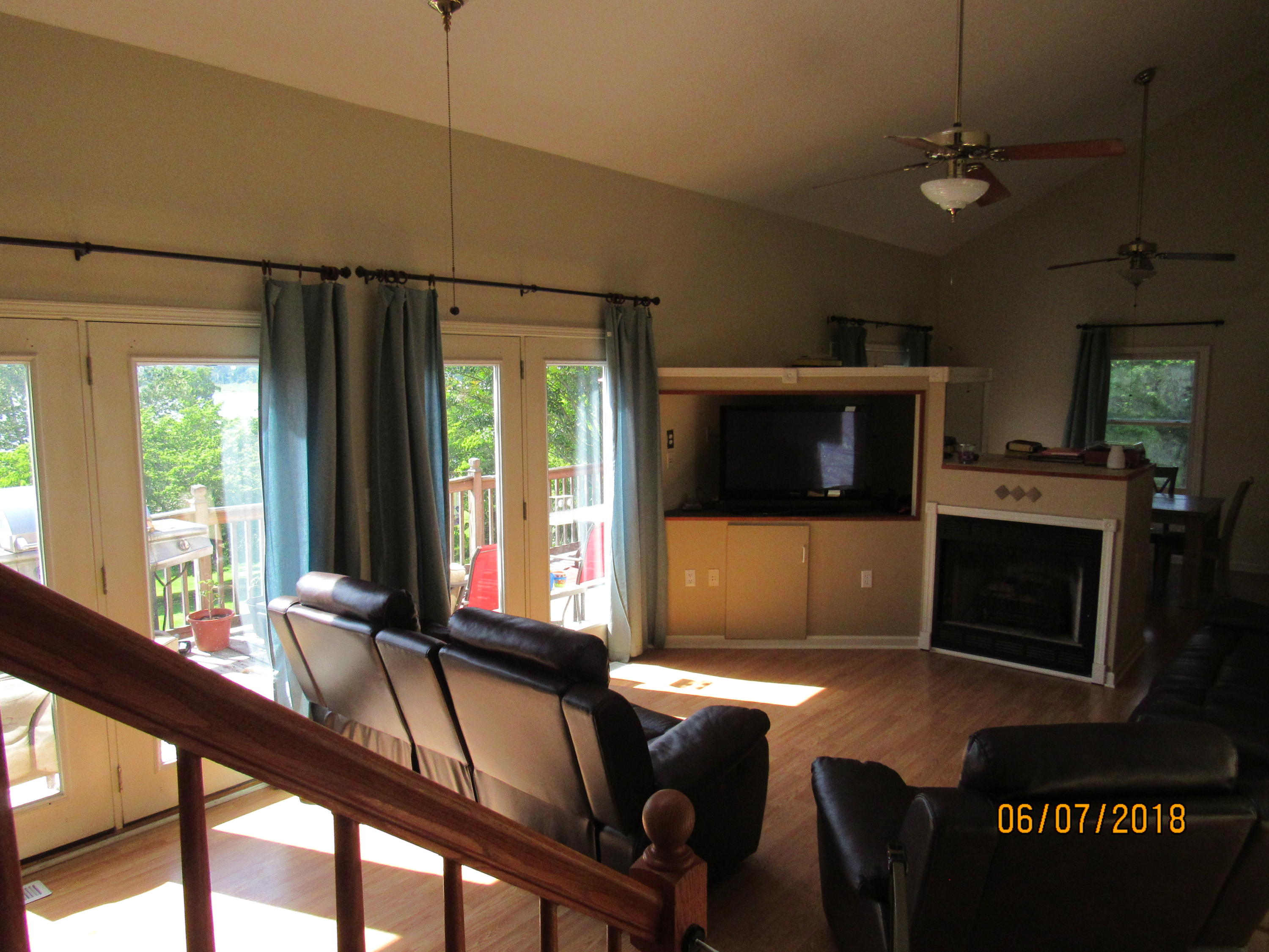 521 Emory River Road Harriman, TN 37748 - Photo 9 of 39 living room view from stairs