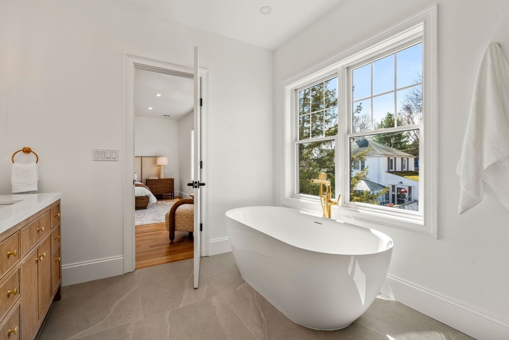 12 Sylvester Road Newton, MA 02465 - Photo 12 of 17 a bathroom with a sink and a bathtub