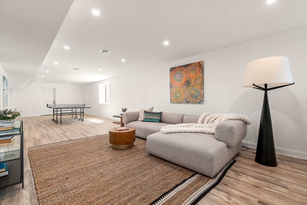 12 Sylvester Road Newton, MA 02465 - Photo 15 of 17 a living room with furniture and a wooden floor