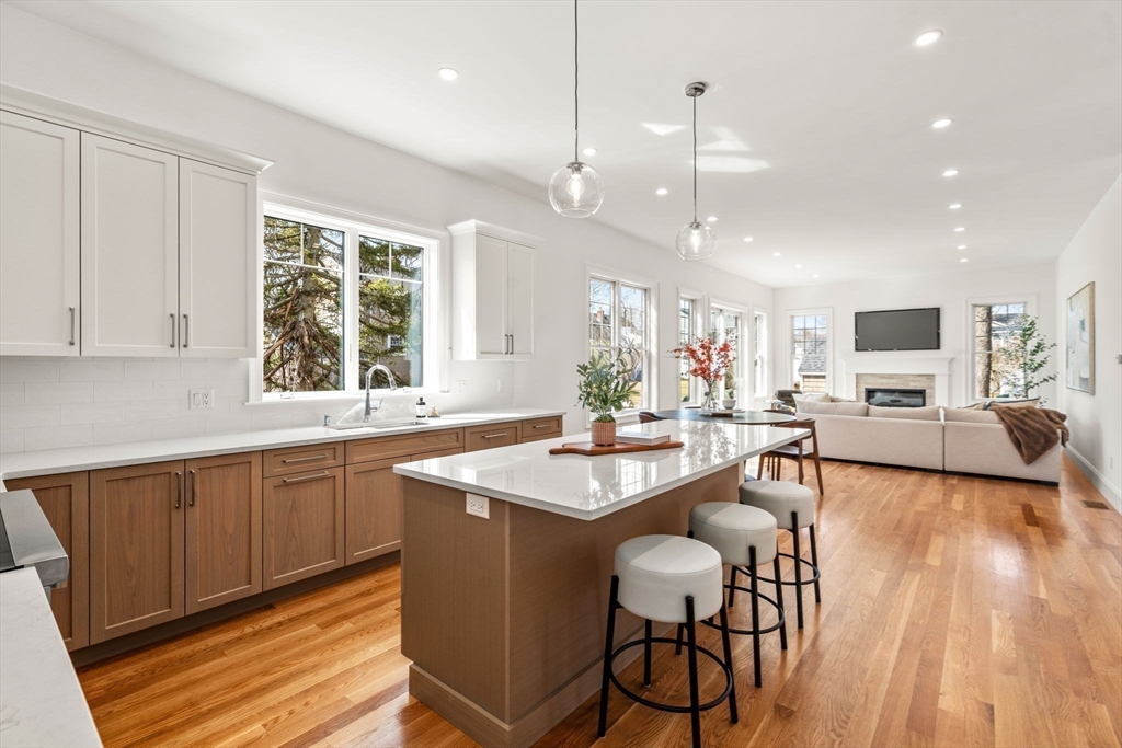 12 Sylvester Road Newton, MA 02465 - Photo 4 of 17 a large kitchen with granite countertop lots of counter space and windows
