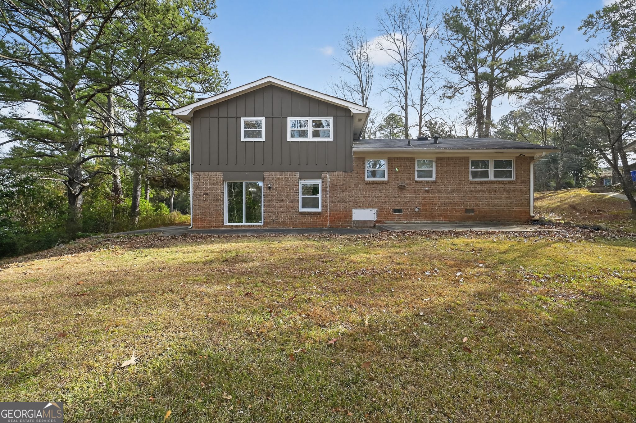 2897 Leisure Woods Lane Decatur, GA 30034 - Photo 29 of 32 a front view of a house with a yard