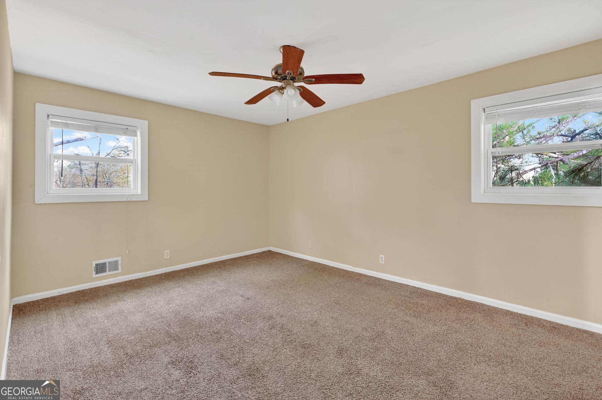 2897 Leisure Woods Lane Decatur, GA 30034 - Photo 5 of 32 a view of an empty room with a window