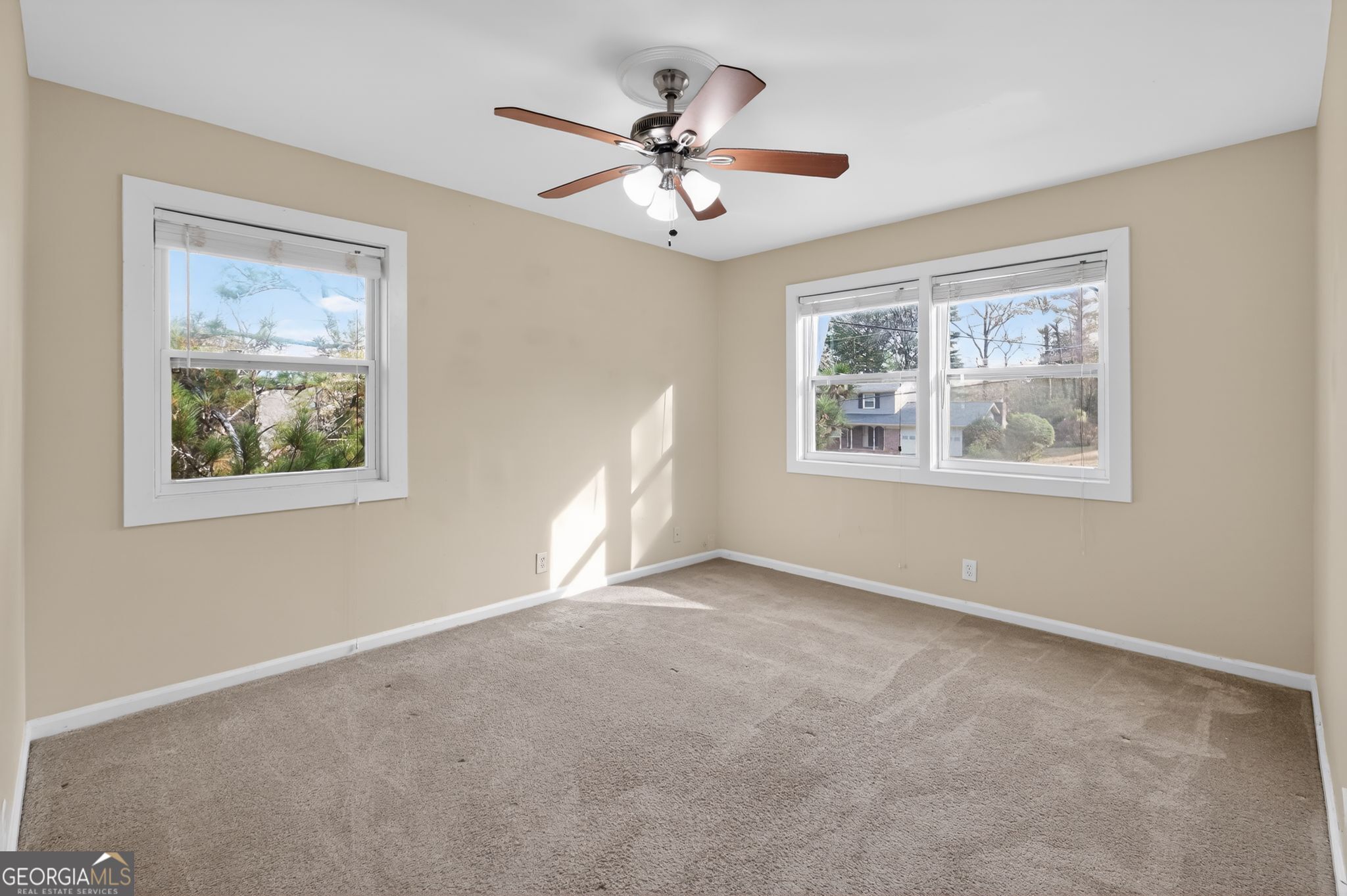 2897 Leisure Woods Lane Decatur, GA 30034 - Photo 7 of 32 a view of an empty room with a window